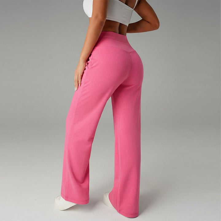 Pantalon femme à jambes larges et droites, taille haute. Tissu extensible