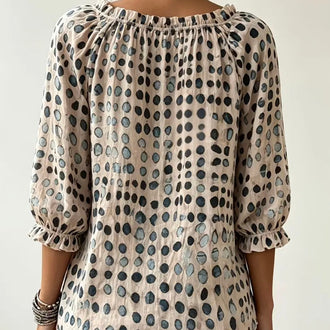 Blouse beige à motifs