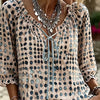 Blouse beige à motifs