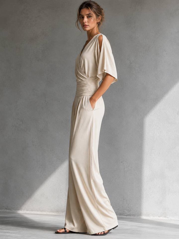 Ondina | Combinaison beige à décolleté croisé et jambes larges