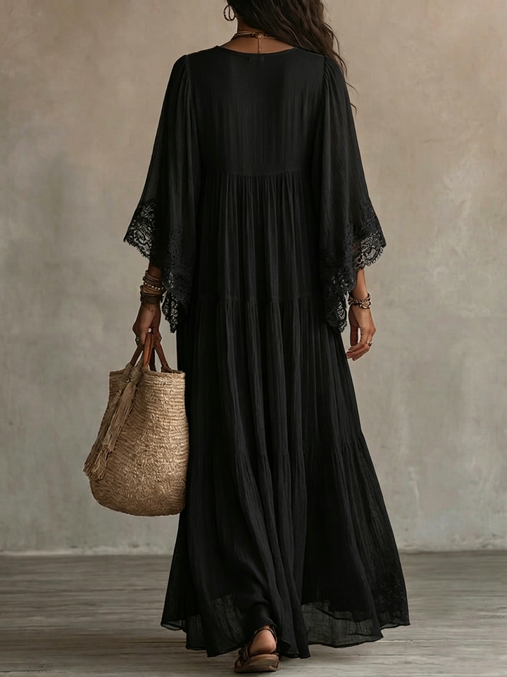 Ambra | Robe maxi noire décolletée en V avec manches chauve-souris