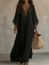Ambra | Robe maxi noire décolletée en V avec manches chauve-souris