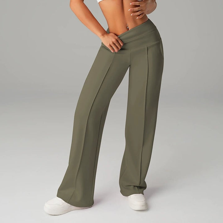 Pantalon femme à jambes larges et droites, taille haute. Tissu extensible