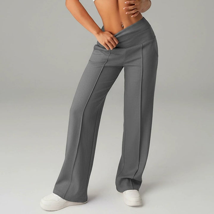 Pantalon femme à jambes larges et droites, taille haute. Tissu extensible