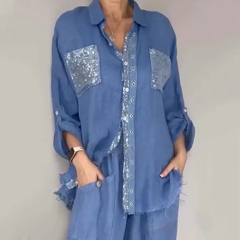 Ensemble composé d'une blouse et d'un pantalon avec des paillettes