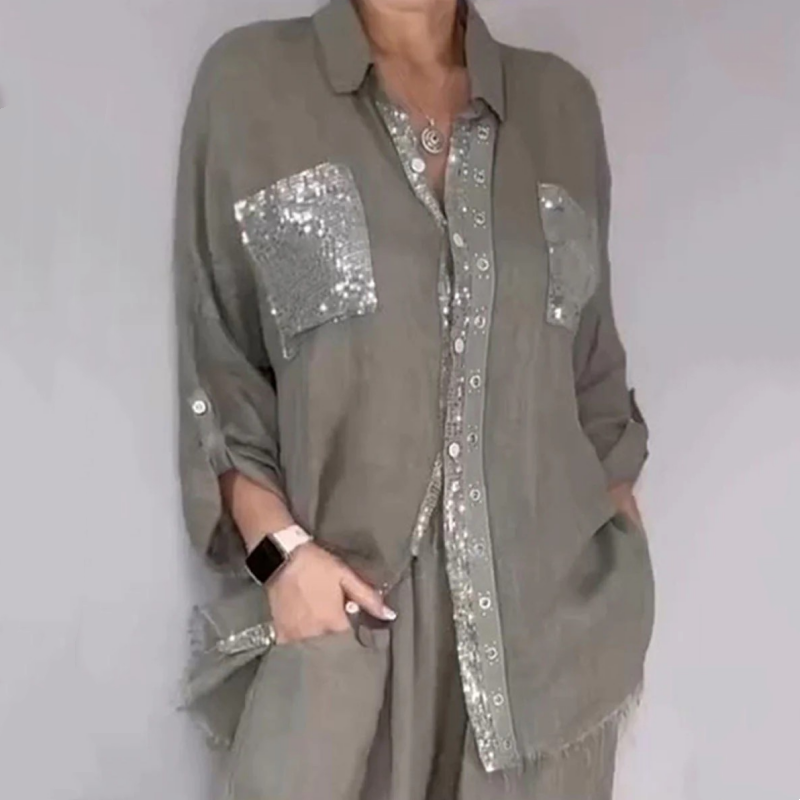 Ensemble composé d'une blouse et d'un pantalon avec des paillettes